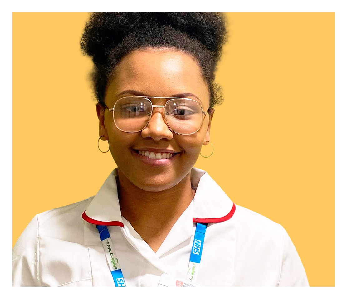 University student Tanisha, 18, smiles for the camera whilst wearing her nursing uniform